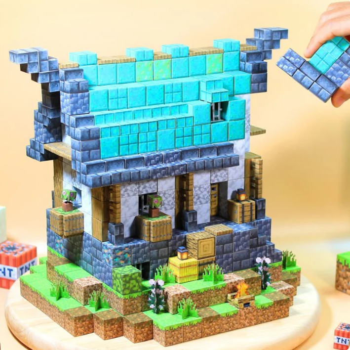 E se tuo figlio costruisse il SUO mondo pixelato... senza schermo? 🎮✨